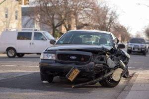 Auto accident attorney Houston - damaged car in street